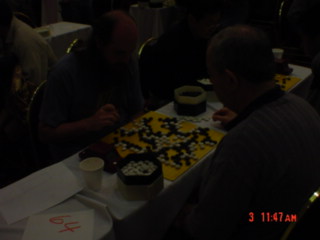 Photograph: Toby Bartels playing Go.